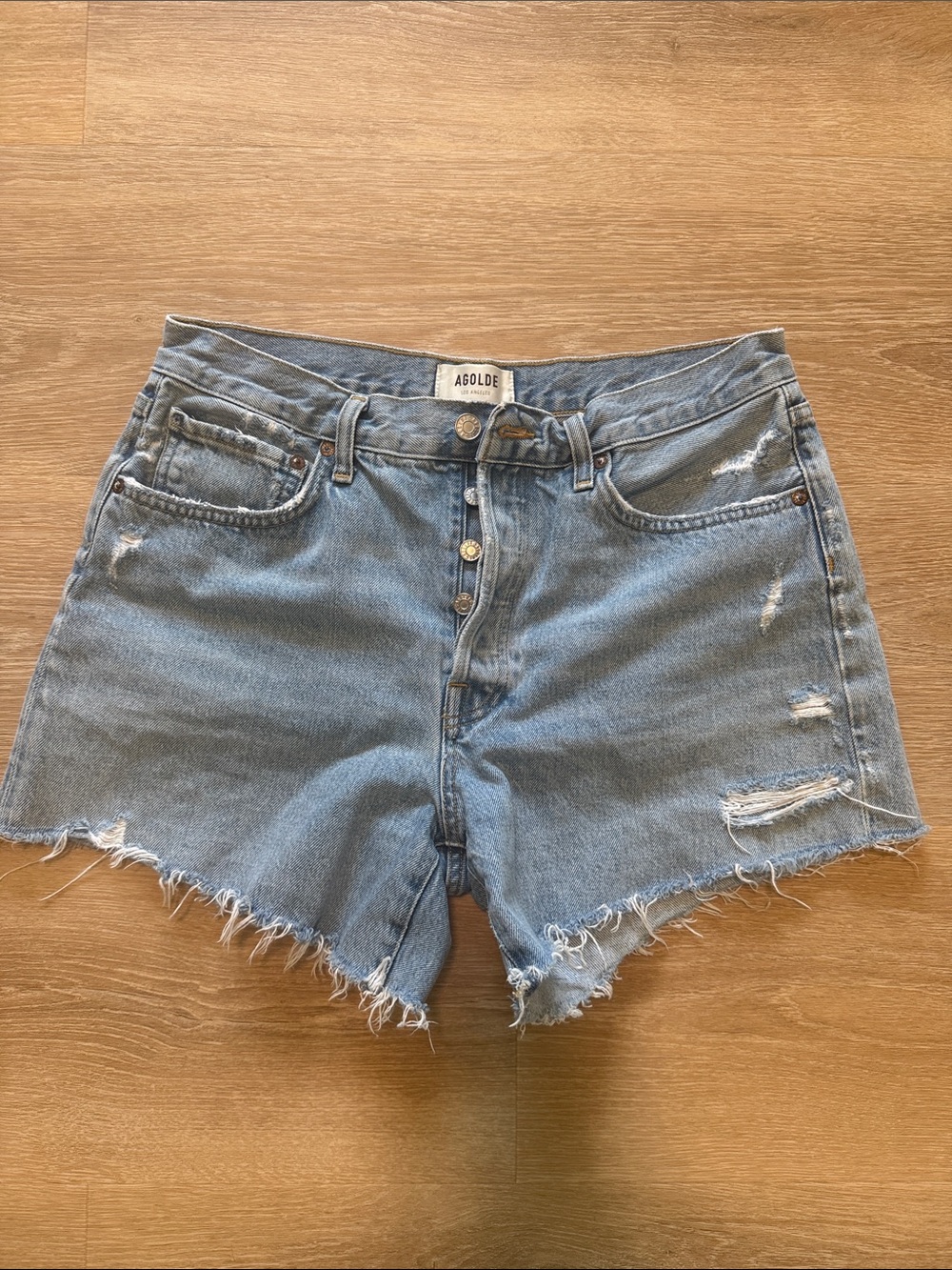Agolde Light Wash High-Rise Distressed Denim Shorts